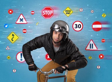 Stylish biker with highway code concept clipart