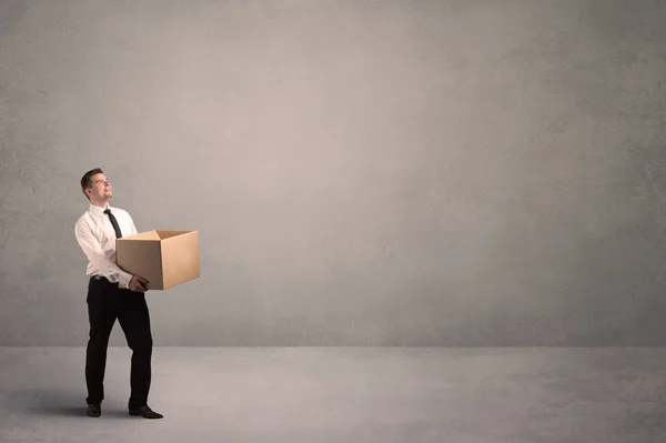 Businessman with empty box — Stock Photo, Image