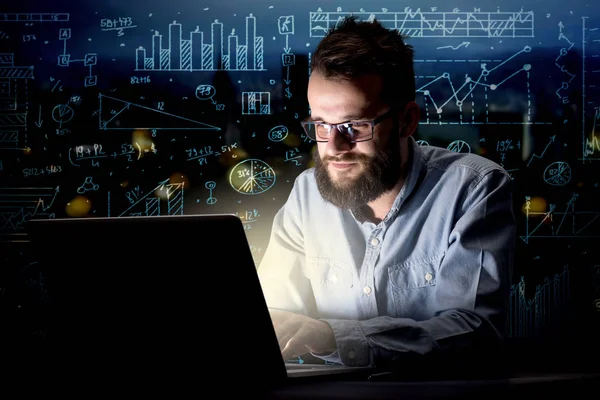 Businessman in the office at night — Stock Photo, Image