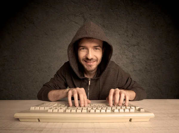 Computer geek typing on keyboard — Stock Photo, Image