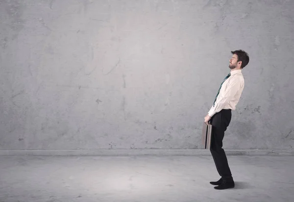 Young businessman standing confused — Stock Photo, Image