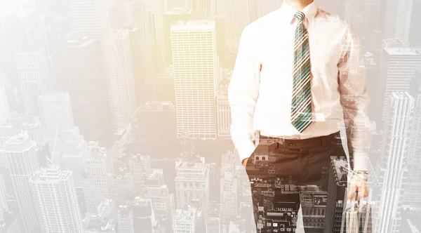 Business person with warm color overlay of city background — Stock Photo, Image