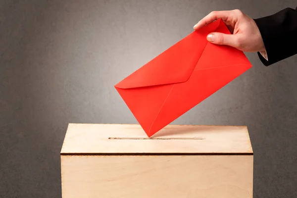 Ballot box with person casting vote — Stock Photo, Image