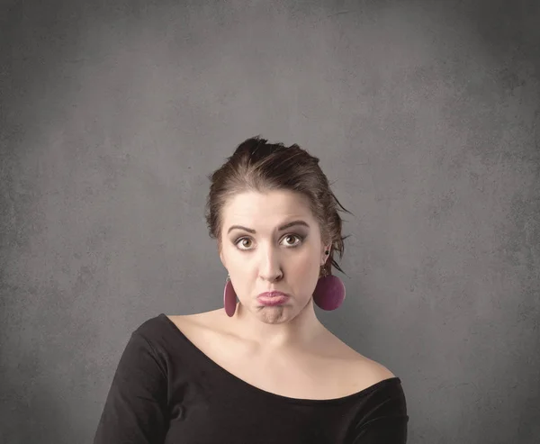 Girl with funny facial expression — Stock Photo, Image