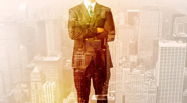 Business man looking at overlay city background — Stock Photo, Image