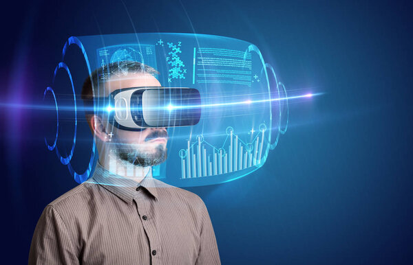 Businessman with virtual reality goggles