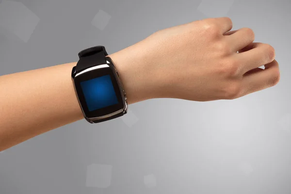 Female hand wearing smartwatch — Stock Photo, Image