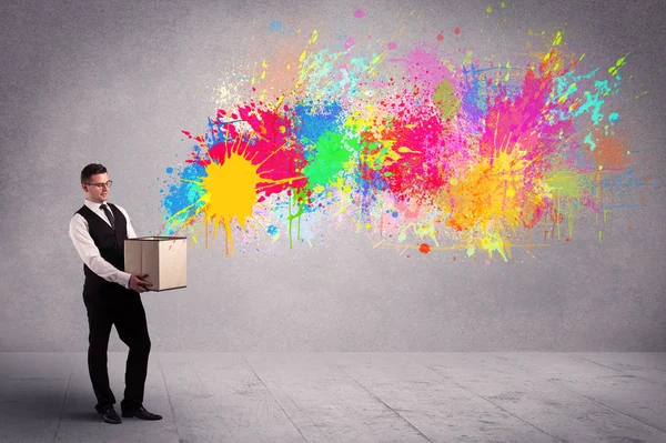 Colour splatter from box — Stock Photo, Image