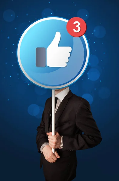Zakenman met facebook aanmelden — Stockfoto