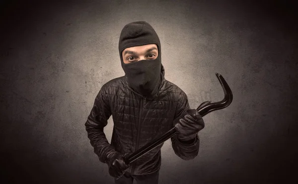 Burglar with tool. — Stock Photo, Image