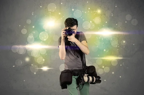 Photographer with flashing lights — Stock Photo, Image