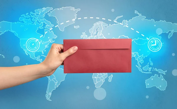 Hand holding envelope with global concept — Stock Photo, Image