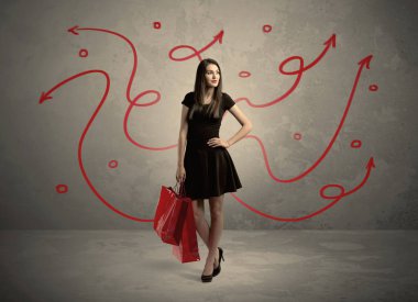 Şık kadın alışverişi ve kırmızı oklar