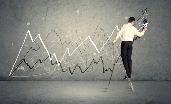 Man on ladder drawing lines — Stock Photo, Image