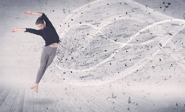 Bailarina de ballet de rendimiento saltando con partículas de explosión de energía —  Fotos de Stock