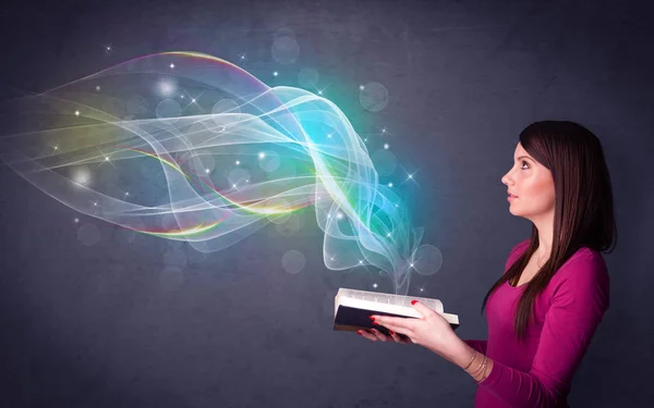 Young lady holding book with waves — Stock Photo, Image