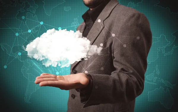 Sales person holding white cloud — Stock Photo, Image