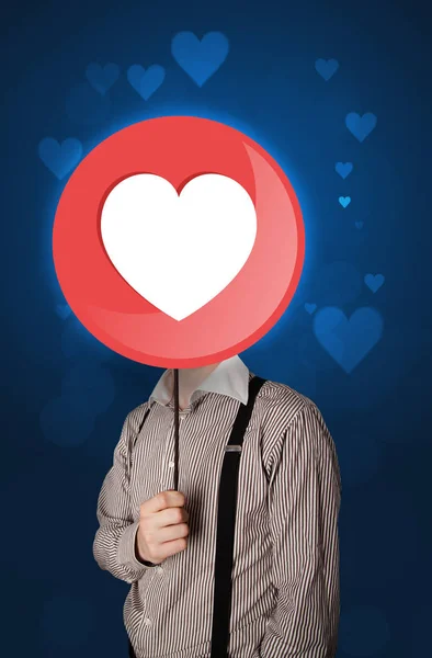 Businessman holding heart sign — Stock Photo, Image