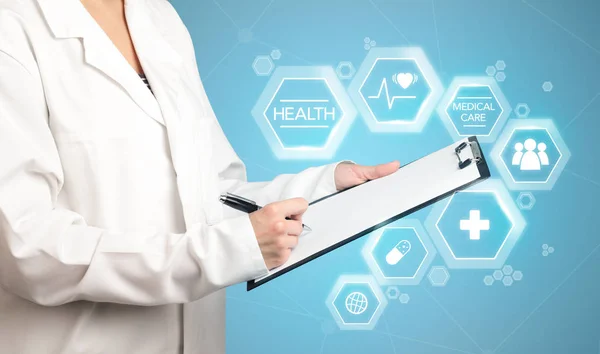 Female doctor with notepad — Stock Photo, Image