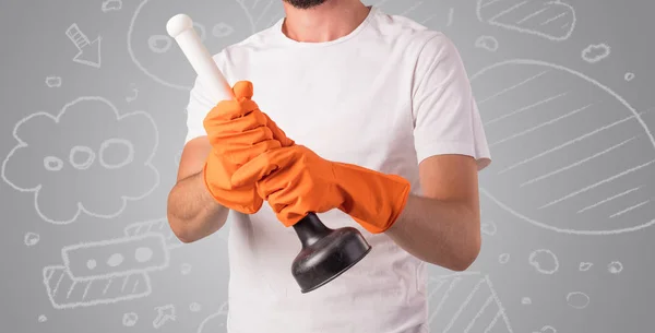 Male housekeeper with grey doodled wallpaper — Stock Photo, Image