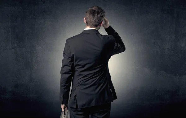 Businessman standing and thinking — Stock Photo, Image