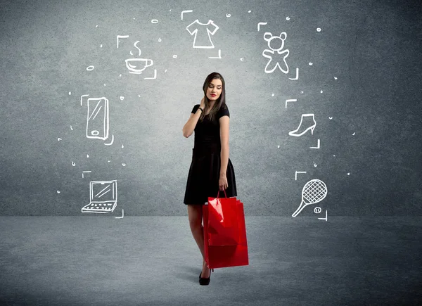 Mujer de compras con bolsos e iconos dibujados —  Fotos de Stock