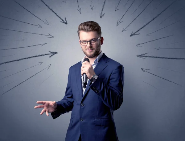 Businessman holding microphone — Stock Photo, Image