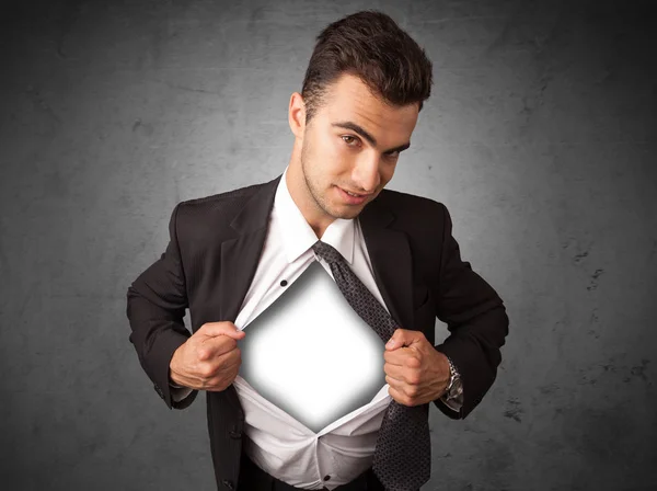 Businessman tearing off his shirt with white copyspace on chest — Stock Photo, Image