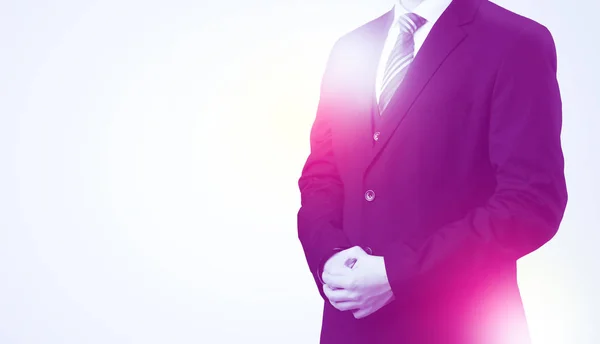 Young businessman standing and thinking — Stock Photo, Image