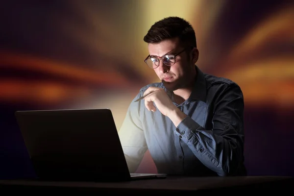 Businessman in the office at night — Stock Photo, Image