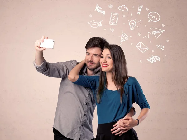 Couple taking selfie with thoughts illustrated — Stock Photo, Image