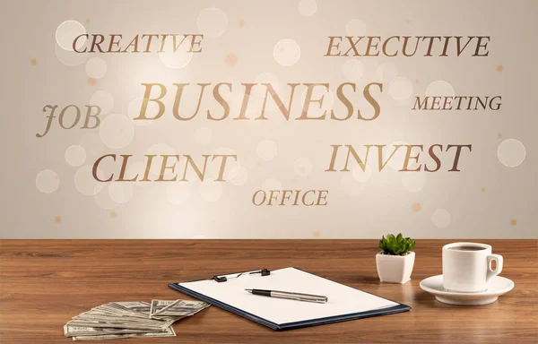 Business office desk with writing on wall — Stock Photo, Image