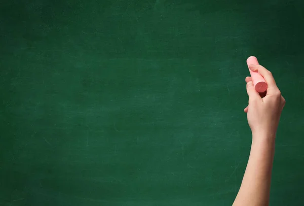 Hand writing on clean blackboard — Stock Photo, Image