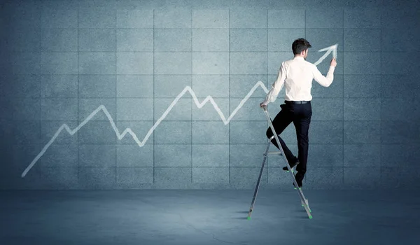 Man drawing line from ladder — Stock Photo, Image