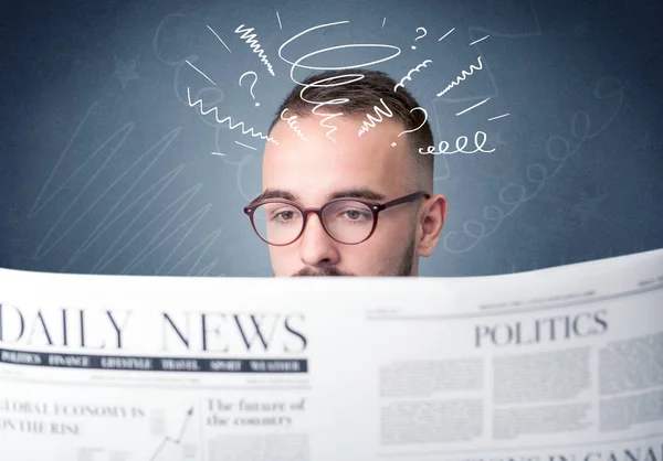 Businessman reading newspaper — Stock Photo, Image