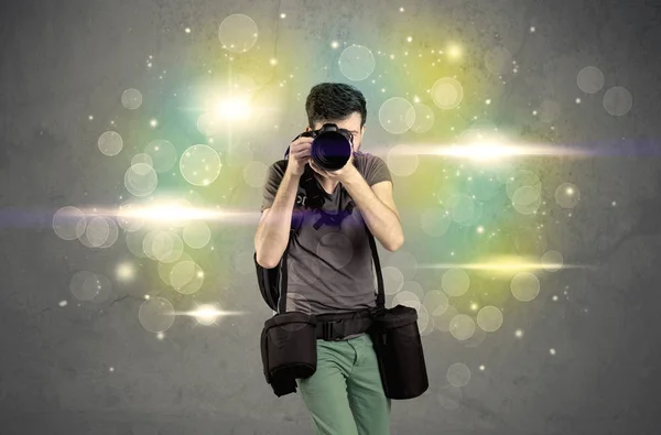 Photographer with flashing lights — Stock Photo, Image