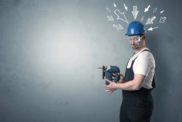 Worker standing with tool. — Stock Photo, Image