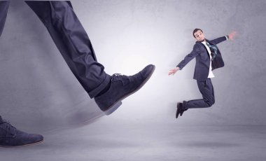 Foot kicking, businessman flying clipart