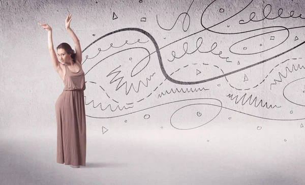 Baletní tanečnice předvádějící umělecký tanec s liniemi a šipkami — Stock fotografie