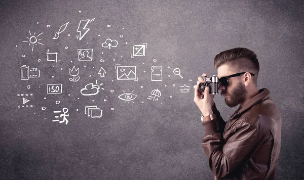 Elegant guy with beard learning photography