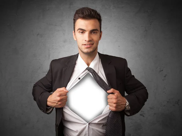 Businessman tearing off his shirt with white copyspace on chest — Stock Photo, Image