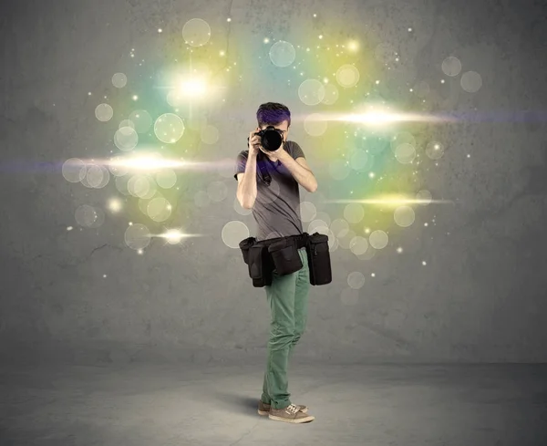 Photographer with flashing lights — Stock Photo, Image