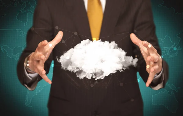 Sales person holding white cloud — Stock Photo, Image