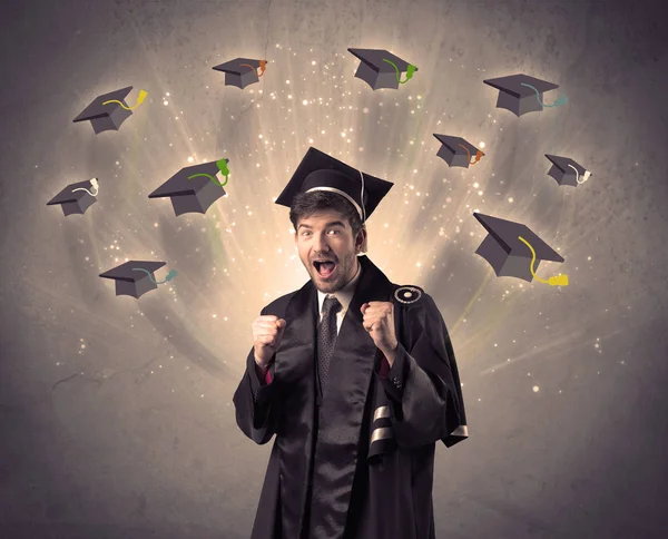 Graduado universitario con muchos sombreros voladores —  Fotos de Stock