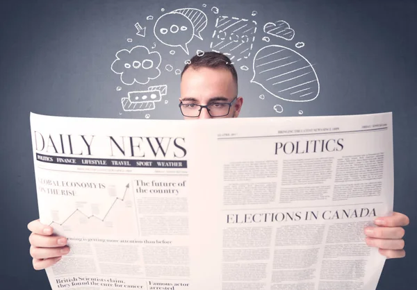 Businessman reading newspaper — Stock Photo, Image