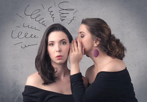 Girl telling secret things to her girlfriend — Stock Photo, Image