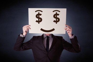 Aç gözlü duygu ile kağıt tutan işadamı 