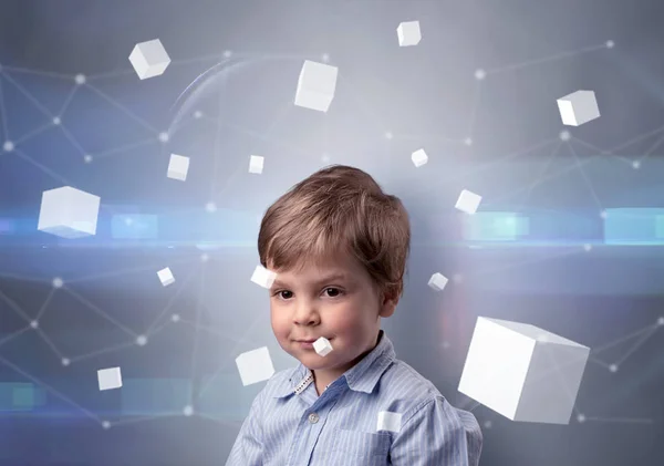 Ragazzo carino con cubi luminosi intorno — Foto Stock