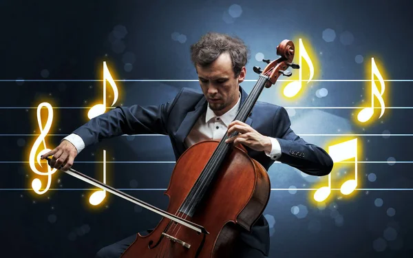 Young cellist with music sheet — Stock Photo, Image