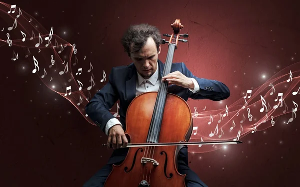 Lonely composer playing on cello — Stock Photo, Image